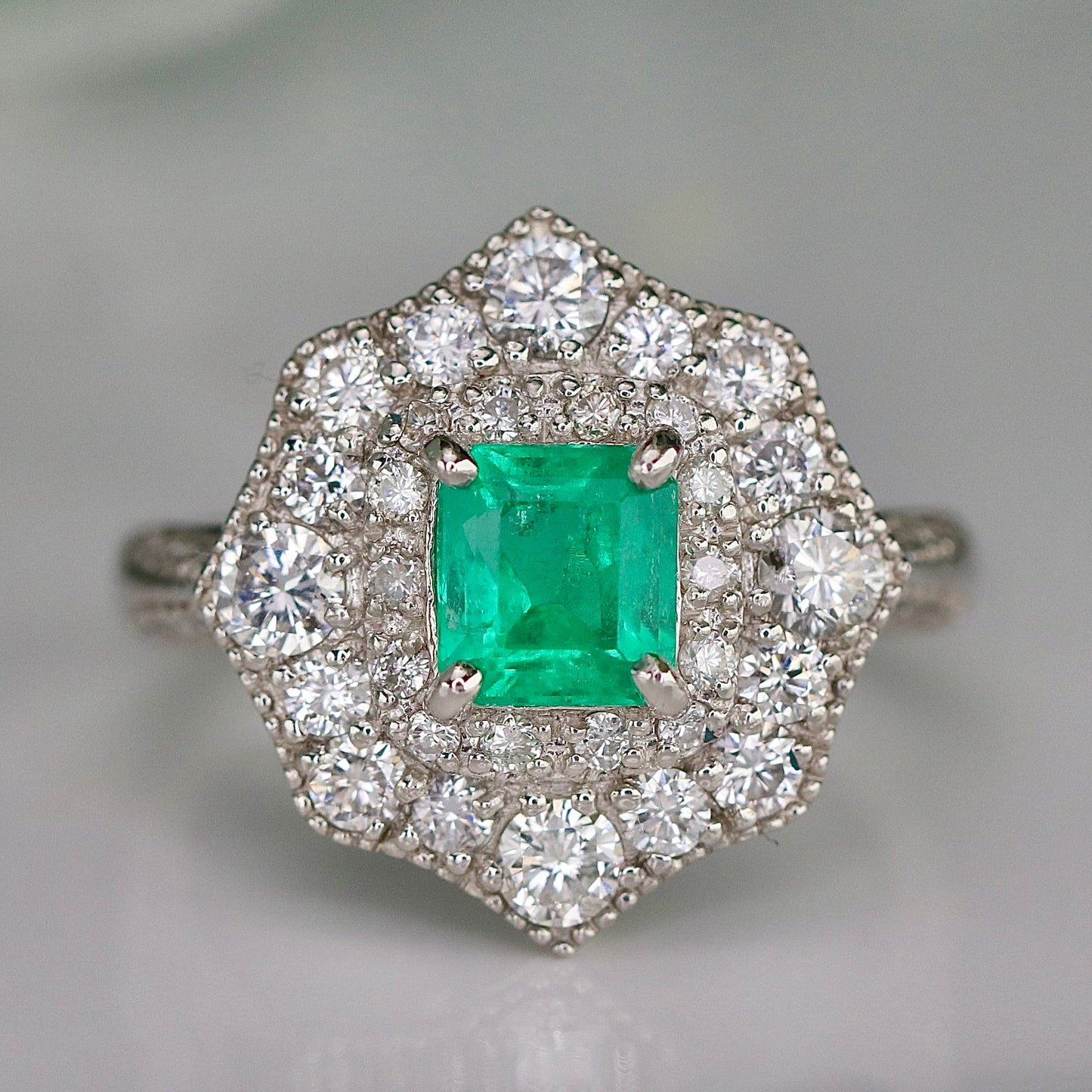Estate Emerald and diamond ring in platinum