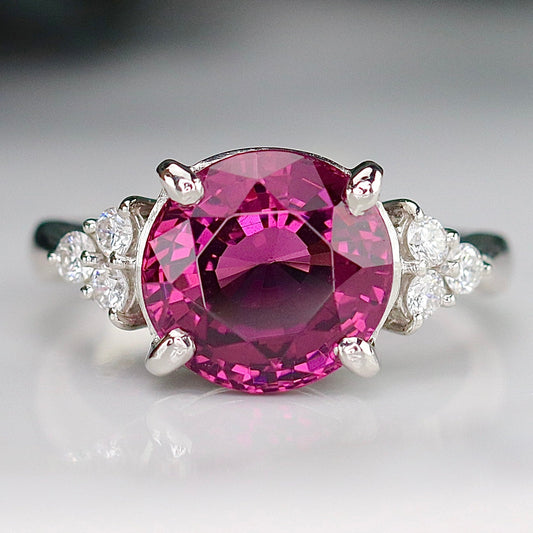 Estate Rhodolite garnet and diamond ring in platinum